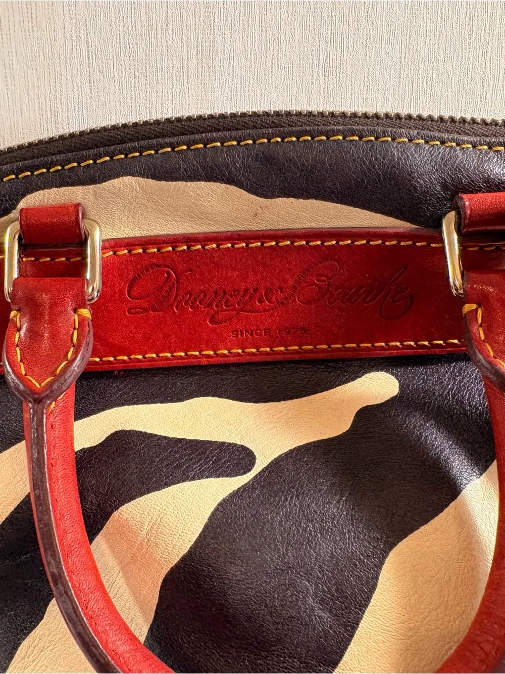 Dooney & Bourke Black and Cream Zebra Satchel with Red Trim